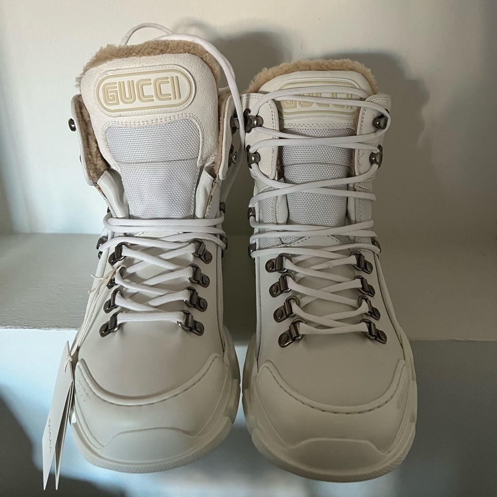 White shearling lined authentic Gucci boots.